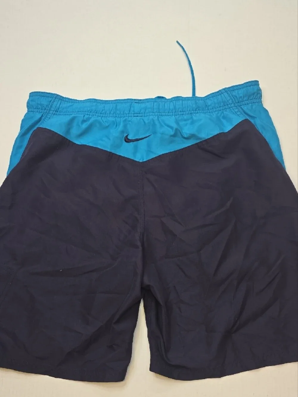 Nike Men’s Dark Blue Swim Trunks with Teal Trim
